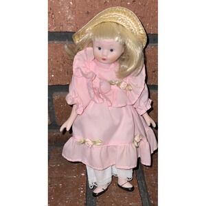 Vintage 8" Porcelain Doll Blonde Hair Blue Eyes Pink Ruffled Dress Straw Hat